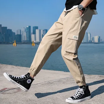 De los hombres casual pantalones sueltos pantalones de chándal, ropa de trabajo marea marca 2021 deportes nuevos pantalones de la ropa