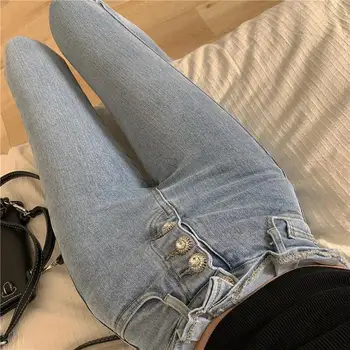 Venta caliente de alta cintura de la mujer pantalones vaqueros de moda chic estiramiento estrechos pantalones versión coreana ins pesado diamante hebilla de jeans