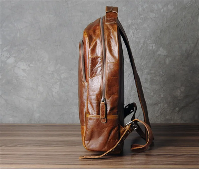 PNDME de la moda vintage de alta calidad de cuero genuino de los hombres de la mochila casual simple diseñadores bolso adolescentes de viaje portátil mochila 0