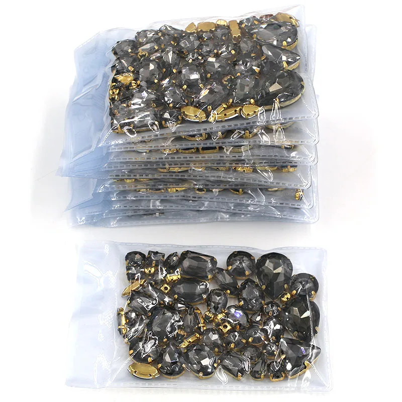 Nueva llegada Mayorista de 5 bolsas mixtas forma de coser en cristal Gris diamantes de imitación de oro de base para la ropa/vestido de 0