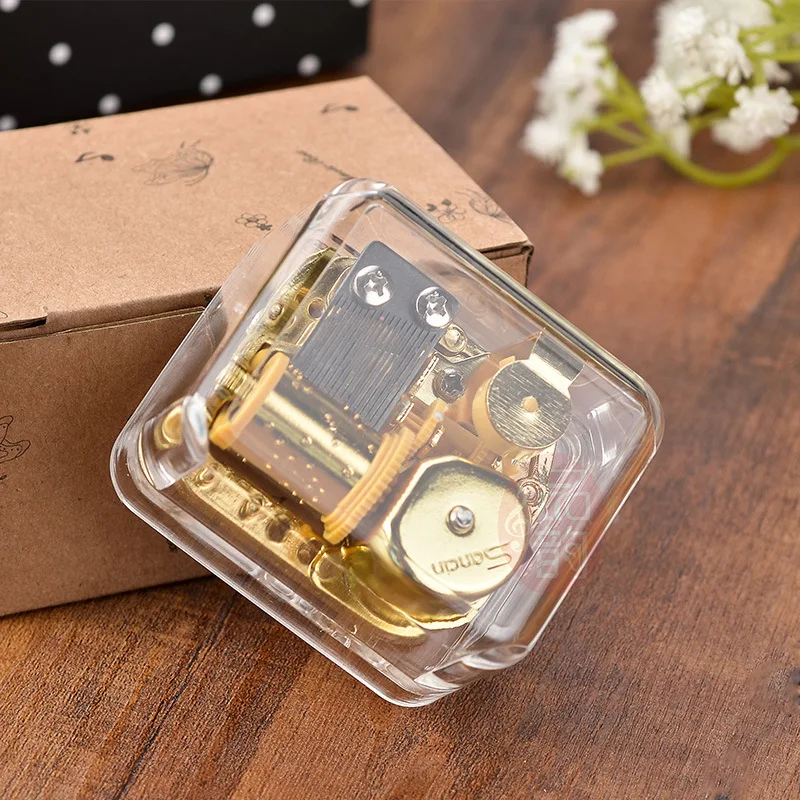 Transparente chapado en oro de la primavera movimiento cuadrado de acrílico caja de música regalo creativo ocho de sonido en el cuadro de muebles para el hogar, decoración del hogar 1