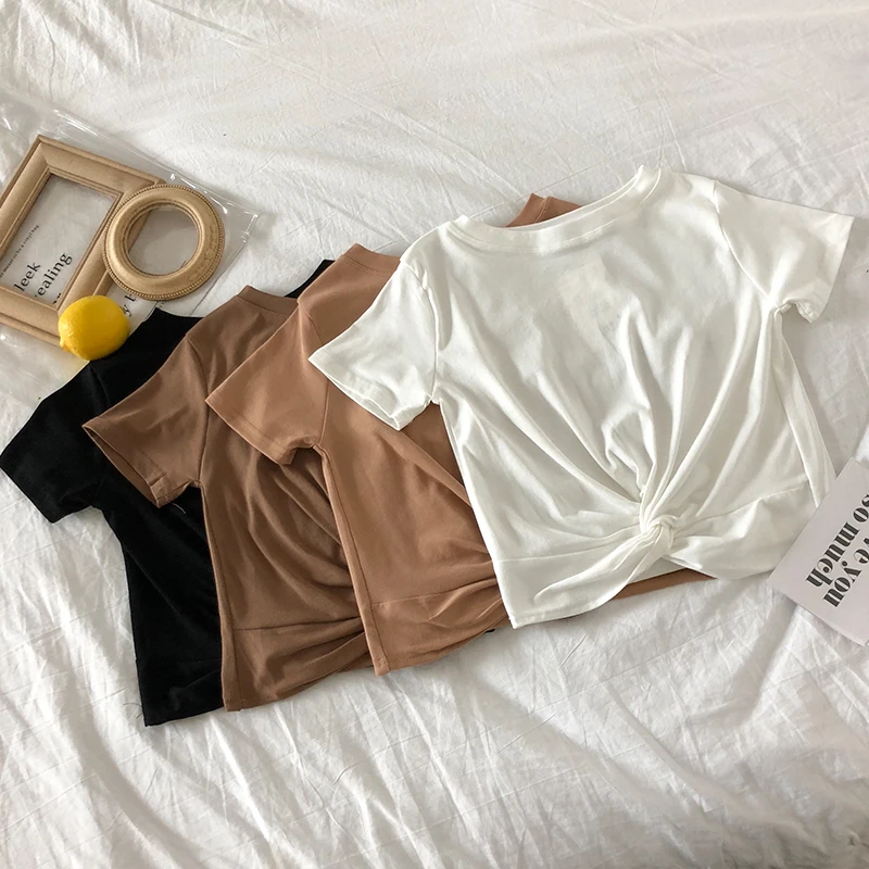 2020 Coreano Nuevo Escrito De Verano Sólido T-Camisas De Las Mujeres Casual O-Cuello De La Moda De Giro Del Nudo Blanco Manga Corta Camisetas 2