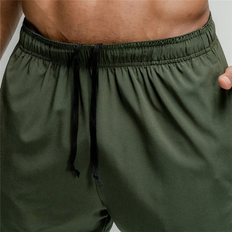 El verano de los hombres de fitness pantalones cortos sueltos culturismo jogger cortos de verano quick dry cool pantalones cortos de los hombres casual de playa de la marca de pantalones de chándal 4