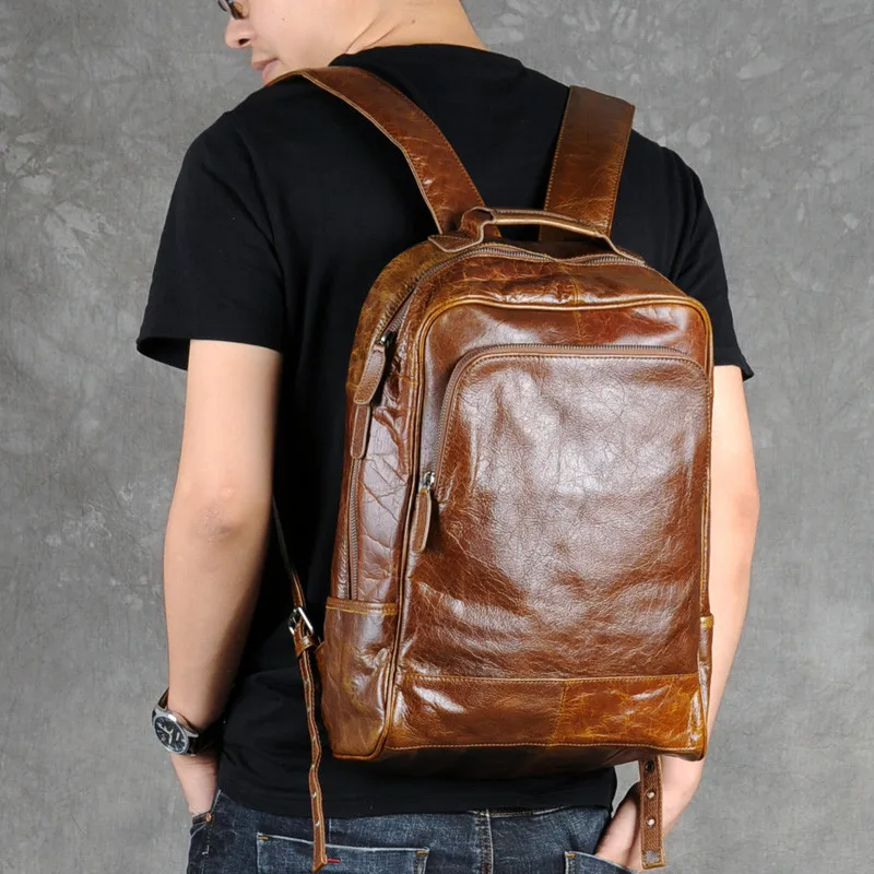 PNDME de la moda vintage de alta calidad de cuero genuino de los hombres de la mochila casual simple diseñadores bolso adolescentes de viaje portátil mochila 5